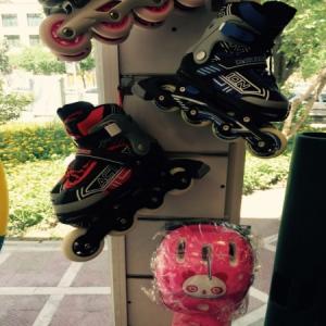 Action skates with safety equipment